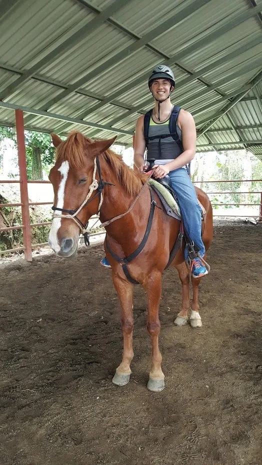Riding a horse for the first time in Costa Rica